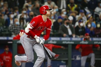 Oct 3, 2021; Seattle, Washington, USA; Los Angeles Angels designated hitter Shohei Ohtani (17) hits a solo-home run against the Seattle Mariners during the first inning at T-Mobile Park. Mandatory Credit: Joe Nicholson-USA TODAY Sports