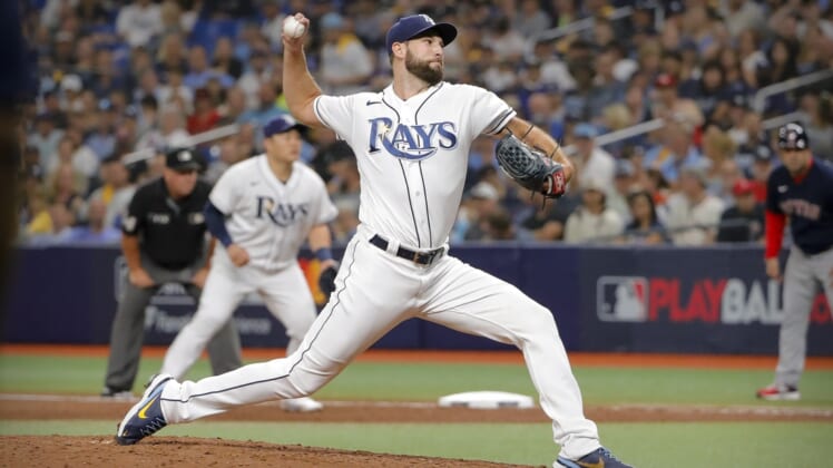 Oct 8, 2021; St. Petersburg, Florida, USA; Tampa Bay Rays relief pitcher Michael Wacha (52) pitches against the Boston Red Sox during the seventh inning in game two of the 2021 ALDS at Tropicana Field. Mandatory Credit: Mike Watters-USA TODAY Sports