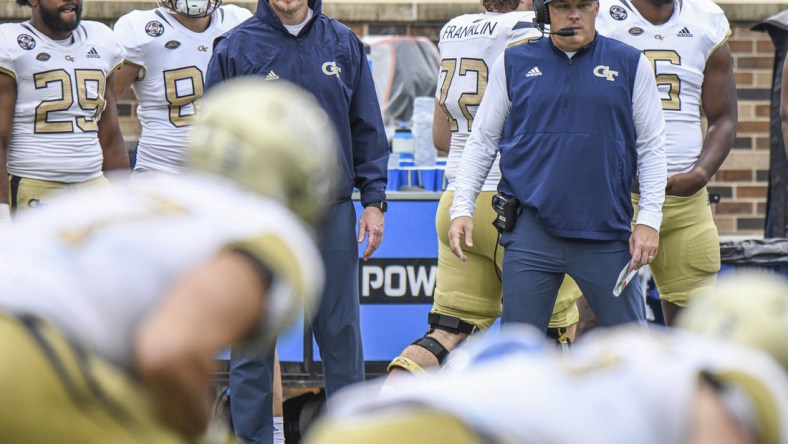 Oct 9, 2021; Durham, North Carolina, Georgia Tech Yellow Jackets head coach Geoff Collins watches his team's offense during the fourth quarter at Wallace Wade Stadium. Mandatory Credit: William Howard-USA TODAY Sports