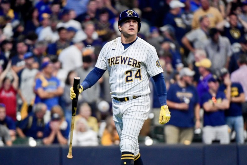 Oct 9, 2021; Milwaukee, Wisconsin, USA; Milwaukee Brewers right fielder Avisail Garcia (24) reacts after striking out against the Atlanta Braves during the eighth inning during game two of the 2021 NLDS at American Family Field. Mandatory Credit: Benny Sieu-USA TODAY Sports