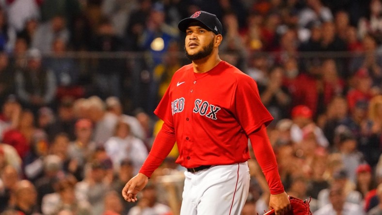 Oct 11, 2021; Boston, Massachusetts, USA; Boston Red Sox starting pitcher Eduardo Rodriguez (57) reacts after being taken out of the game during the sixth inning of their game against the Tampa Bay Rays during game four of the 2021 ALDS at Fenway Park. Mandatory Credit: David Butler II-USA TODAY Sports