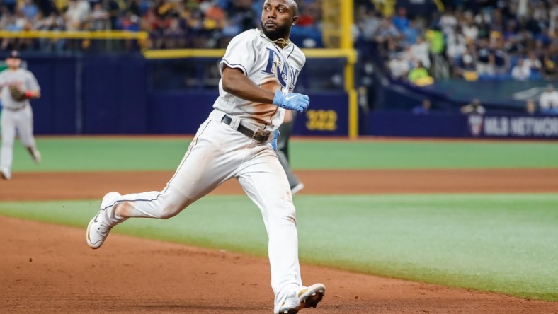 Oct 7, 2021; St. Petersburg, Florida, USA; Tampa Bay Rays left fielder Randy Arozarena (56) runs to third base in the seventh inning against the Boston Red Sox during game one of the 2021 ALDS at Tropicana Field. Mandatory Credit: Mike Watters-USA TODAY Sports