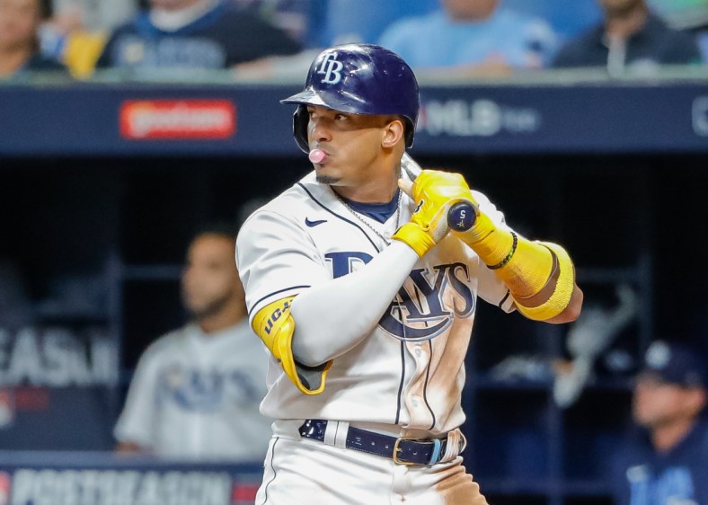 Oct 7, 2021; St. Petersburg, Florida, USA; Tampa Bay Rays shortstop Wander Franco (5) blows a bubble while waiting for a pitch in the seventh inning against the Boston Red Sox during game one of the 2021 ALDS at Tropicana Field. Mandatory Credit: Mike Watters-USA TODAY Sports