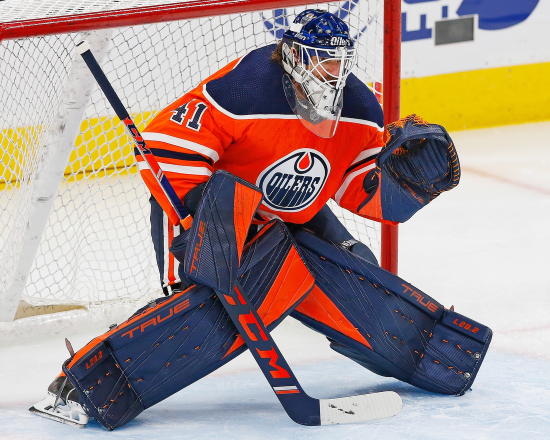 Oct 7, 2021; Edmonton, Alberta, CAN; Edmonton Oilers goaltender Mike Smith (41) skates against the Vancouver Canucks at Rogers Place. Mandatory Credit: Perry Nelson-USA TODAY Sports