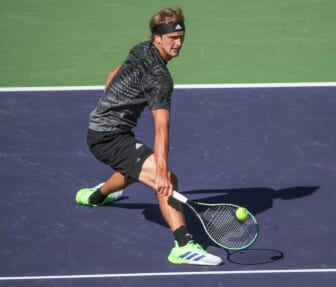 Alexander Zverev hits a shot against Taylor Fritz during their quarterfinal match at the BNP Paribas Open in Indian Wells, October 15, 2021.Bnp Friday 6