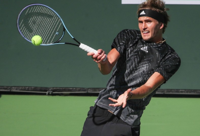 Alexander Zverev hits a shot against Taylor Fritz during their quarterfinal match at the BNP Paribas Open in Indian Wells, October 15, 2021.

Bnp Friday 6