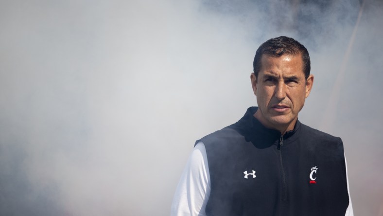 Oct 16, 2021; Cincinnati, Ohio, USA; Cincinnati Bearcats head coach Luke Fickell looks on before the NCAA football game between the Cincinnati Bearcats and the UCF Knights at Nippert Stadium. Mandatory Credit: Albert Cesare / The Enquirer-USA TODAY Sports