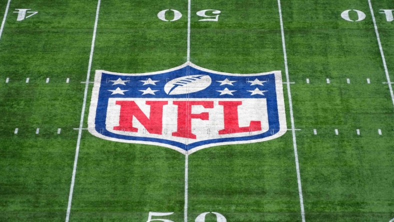 Oct 17, 2021; London, England, United Kingdom; A general overall view of the NFL Shield logo at midfield during an NFL International Series game between the Miami Dolphins and the Jacksonville Jaguars at Tottenham Hotspur Stadium.  Mandatory Credit: Kirby Lee-USA TODAY Sports