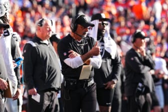 Oct 17, 2021; Denver, Colorado, USA; Las Vegas Raiders interim head coach Rich Bisaccia reacts to a play in the second half against the Denver Broncos at Empower Field at Mile High. Mandatory Credit: Ron Chenoy-USA TODAY Sports