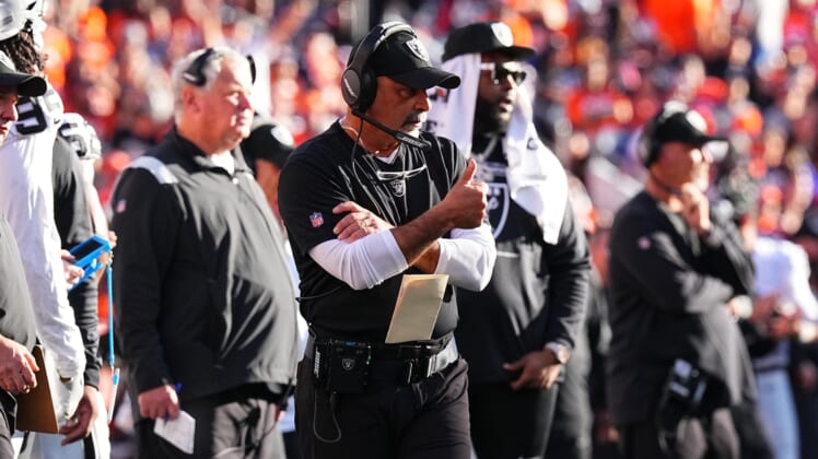 Oct 17, 2021; Denver, Colorado, USA; Las Vegas Raiders interim head coach Rich Bisaccia reacts to a play in the second half against the Denver Broncos at Empower Field at Mile High. Mandatory Credit: Ron Chenoy-USA TODAY Sports