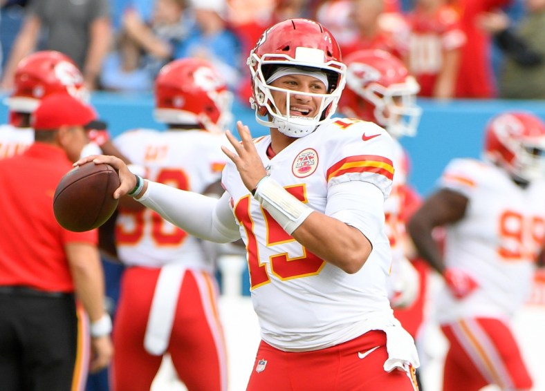 Oct 24, 2021; Nashville, Tennessee, USA; Kansas City Chiefs quarterback Patrick Mahomes (15) throws during warm ups against the Tennessee Titans  at Nissan Stadium. Mandatory Credit: Steve Roberts-USA TODAY Sports