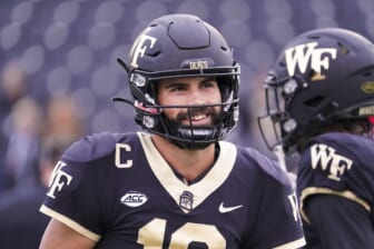 Oct 30, 2021; Winston-Salem, North Carolina, USA;  Wake Forest Demon Deacons quarterback Sam Hartman (10) smiles before the game against the Duke Blue Devils at Truist Field. Mandatory Credit: James Guillory-USA TODAY Sports