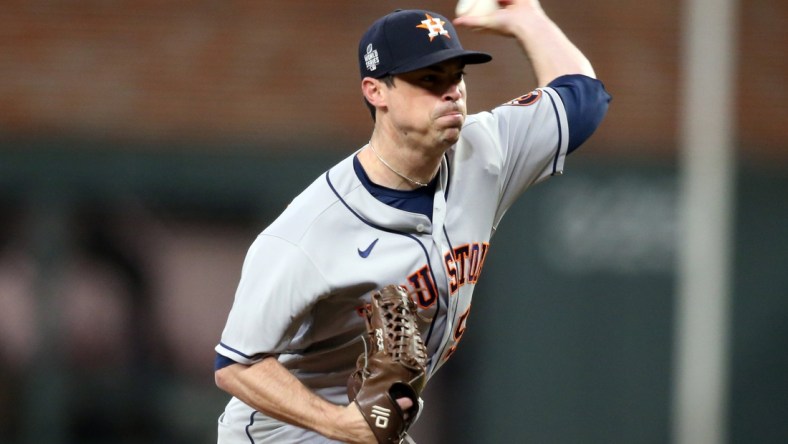 Oct 30, 2021; Atlanta, Georgia, USA; Houston Astros relief pitcher Brooks Raley (58) throws against the Atlanta Braves during the sixth inning of game four of the 2021 World Series at Truist Park. Mandatory Credit: Brett Davis-USA TODAY Sports