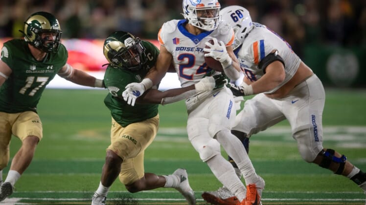 CSU football's Dequan Jackson takes down Boise State's Kyjuan Herndon during a game at Canvas Stadium on Saturday, Oct. 30, 2021.Ftc 1029 Ja Phs Rm Fball 037
