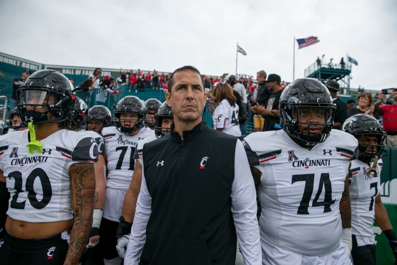 University of Cincinnati Bearcats head coach Luke Fickell and his team take the field to face Tulane University at Yulman Stadium in New Orleans Saturday, October 30, 2021.

Uc Tulane20