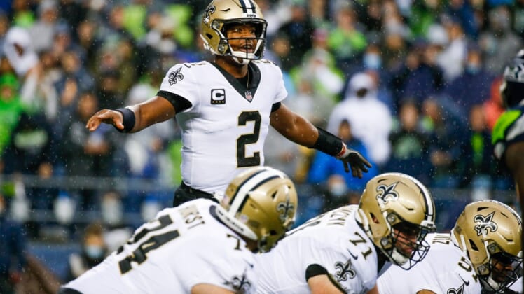 Oct 25, 2021; Seattle, Washington, USA; New Orleans Saints quarterback Jameis Winston (2) stands over center against the Seattle Seahawks during the second quarter at Lumen Field. Mandatory Credit: Joe Nicholson-USA TODAY Sports