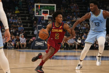 Oct 20, 2021; Memphis, Tennessee, USA; Cleveland Cavaliers guard Collin Sexton (2) drives to the basket as Memphis Grizzles forward Jaren Jackson Jr. (13) during the first half at FedExForum. Mandatory Credit: Petre Thomas-USA TODAY Sports