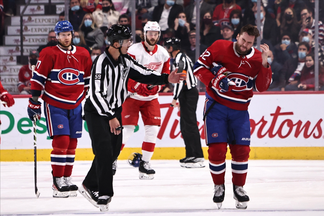 Nov 2, 2021; Montreal, Quebec, CAN; Montreal Canadiens left wing Jonathan Drouin (92) reacts after being hit by the puck during the first period against Detroit Red Wings at Bell Centre. Mandatory Credit: Jean-Yves Ahern-USA TODAY Sports