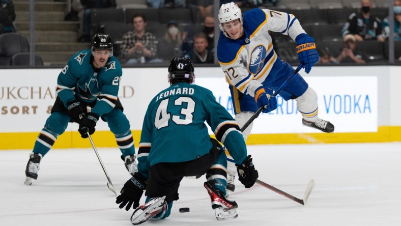 Nov 2, 2021; San Jose, California, USA; Buffalo Sabres right wing Tage Thompson (72) leaps after shooting the puck during the first period against San Jose Sharks left wing John Leonard (43) at SAP Center at San Jose. Mandatory Credit: Stan Szeto-USA TODAY Sports