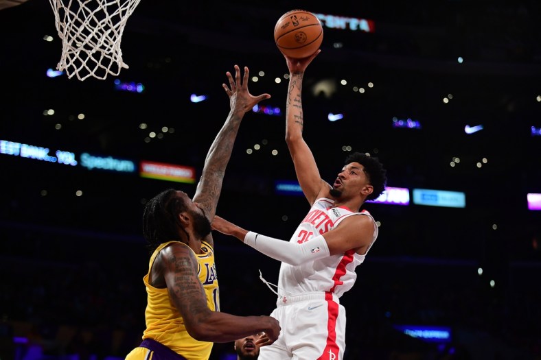 Nov 2, 2021; Los Angeles, California, USA; Houston Rockets center Christian Wood (35) shoots over Los Angeles Lakers center DeAndre Jordan (10) during the first half at Staples Center. Mandatory Credit: Gary A. Vasquez-USA TODAY Sports