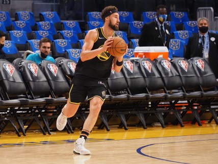 Nov 3, 2021; San Francisco, California, USA; Golden State Warriors guard Klay Thompson (11) warms up before the game against the Charlotte Hornets at Chase Center. Mandatory Credit: Kelley L Cox-USA TODAY Sports