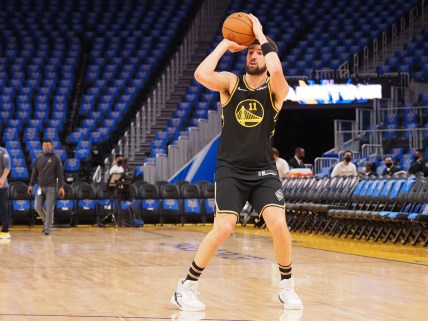 Nov 3, 2021; San Francisco, California, USA; Golden State Warriors guard Klay Thompson (11) warms up before the game against the Charlotte Hornets at Chase Center. Mandatory Credit: Kelley L Cox-USA TODAY Sports