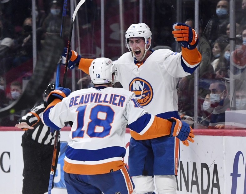 Nov 4, 2021; Montreal, Quebec, CAN; New York Islanders forward Brock Nelson (29) reacts with teammate forward Anthony Beauvillier (18) after scoring a goal against the Montreal Canadiens during the second period at the Bell Centre. Mandatory Credit: Eric Bolte-USA TODAY Sports