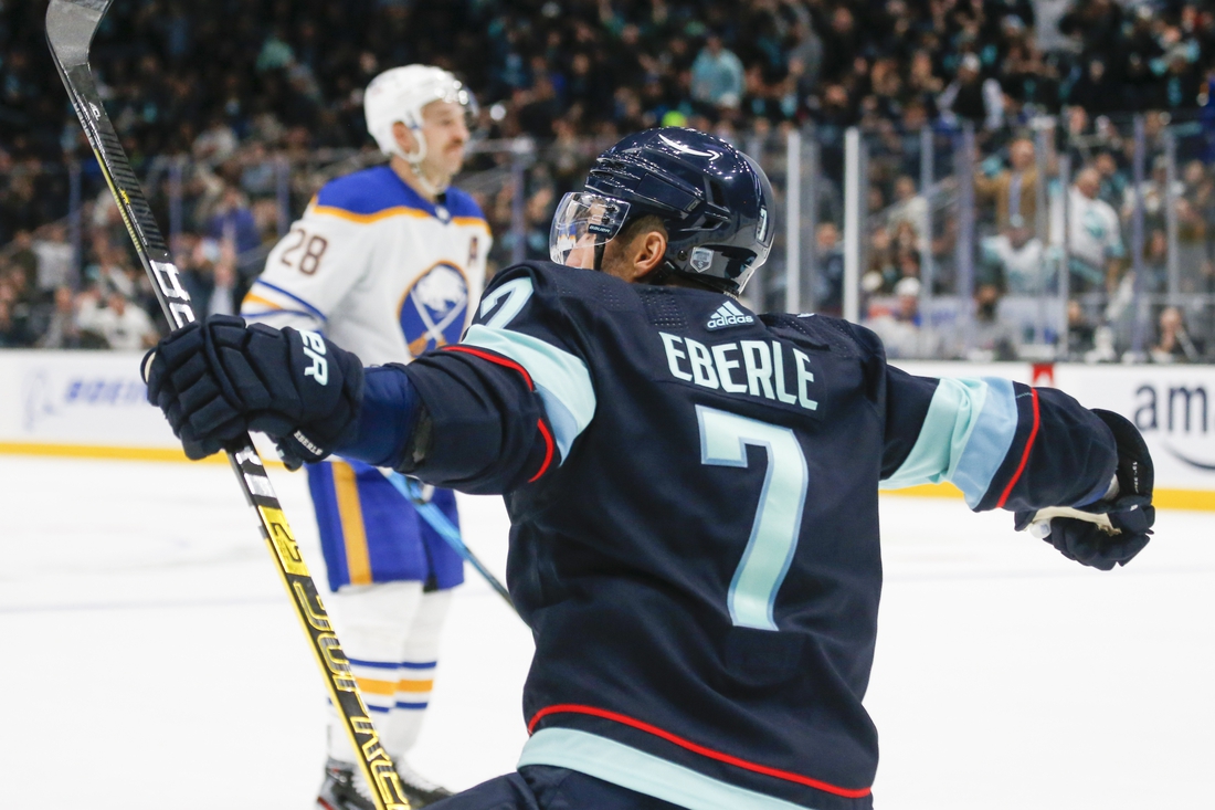 Nov 4, 2021; Seattle, Washington, USA; Seattle Kraken right wing Jordan Eberle (7) celebrates after scoring a goal against the Buffalo Sabres during the second period at Climate Pledge Arena. Mandatory Credit: Joe Nicholson-USA TODAY Sports