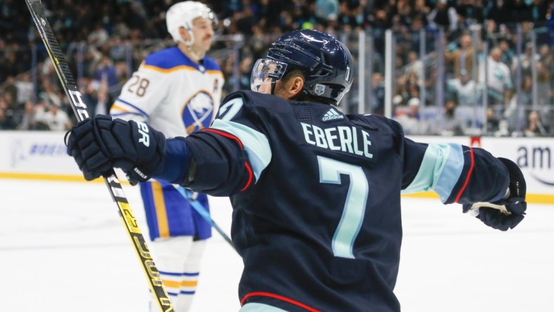 Nov 4, 2021; Seattle, Washington, USA; Seattle Kraken right wing Jordan Eberle (7) celebrates after scoring a goal against the Buffalo Sabres during the second period at Climate Pledge Arena. Mandatory Credit: Joe Nicholson-USA TODAY Sports