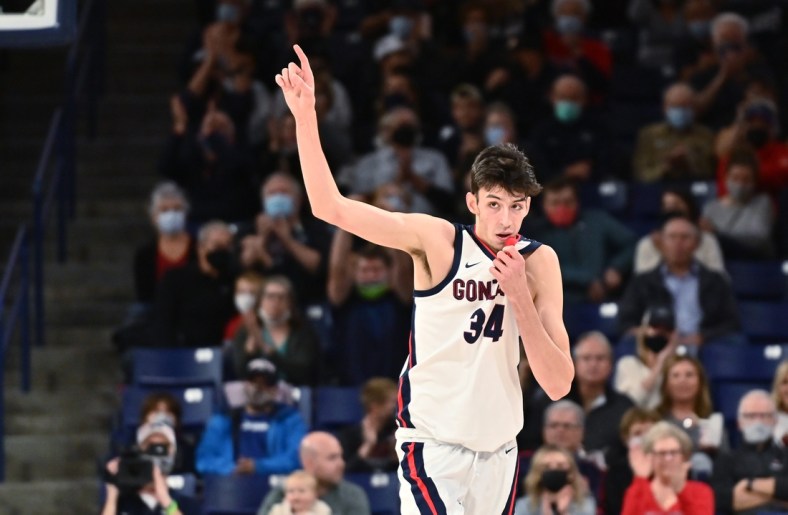 Nov 5, 2021; Spokane, WA, USA; Gonzaga Bulldogs center Chet Holmgren (34) celebrates after a three-pointer against the Lewis-Clark State Warriors in the first half at McCarthey Athletic Center. Mandatory Credit: James Snook-USA TODAY Sports