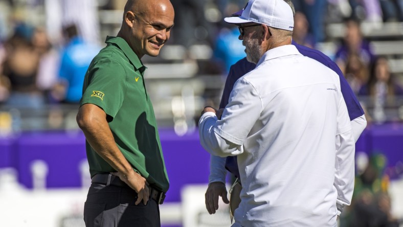 Nov 6, 2021; Fort Worth, Texas, USA;  TCU Horned Frogs interim head coach Jerry Kill chats with Baylor head coach Dave Aranda before the game at Amon G. Carter Stadium. Mandatory Credit: Kevin Jairaj-USA TODAY Sports