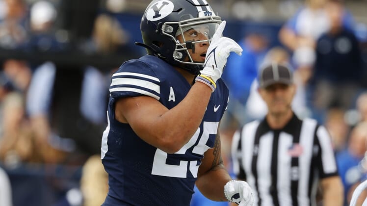 Nov 6, 2021; Provo, Utah, USA; Brigham Young Cougars running back Tyler Allgeier (25) reacts after his first quarter touchdown against the Idaho State Bengals at LaVell Edwards Stadium. Mandatory Credit: Jeffrey Swinger-USA TODAY Sports