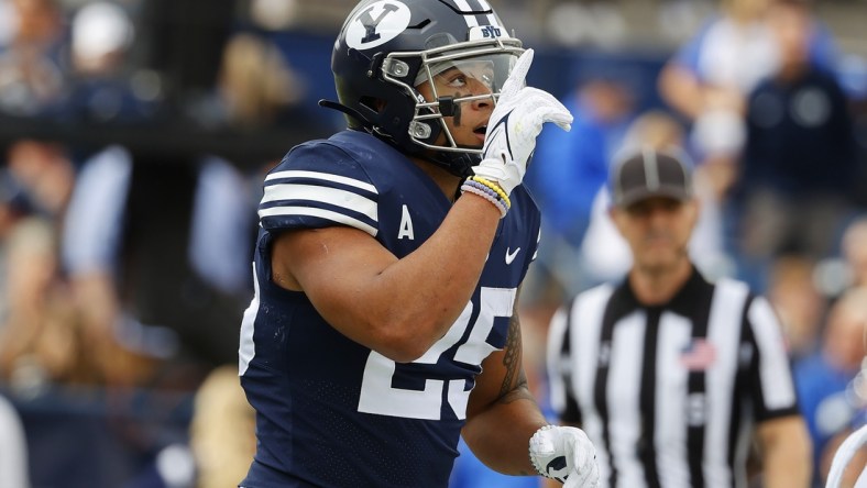 Nov 6, 2021; Provo, Utah, USA; Brigham Young Cougars running back Tyler Allgeier (25) reacts after his first quarter touchdown against the Idaho State Bengals at LaVell Edwards Stadium. Mandatory Credit: Jeffrey Swinger-USA TODAY Sports