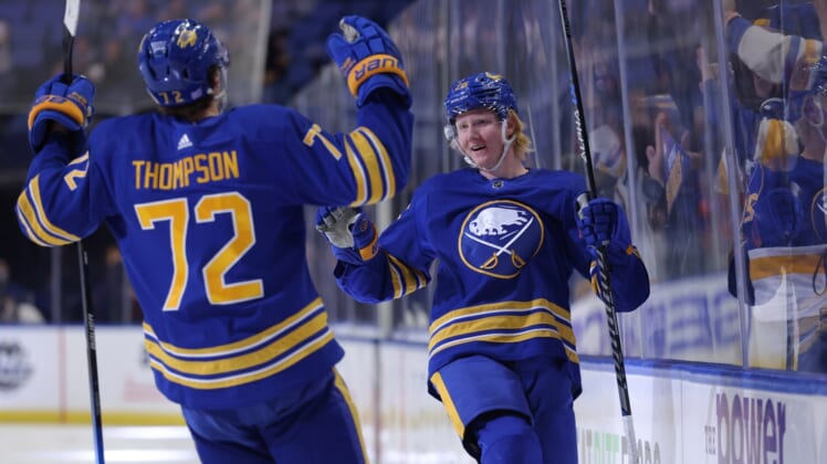 Nov 6, 2021; Buffalo, New York, USA;  Buffalo Sabres defenseman Rasmus Dahlin (26) celebrates his goal with right wing Tage Thompson (72) during the second period against the Detroit Red Wings at KeyBank Center. Mandatory Credit: Timothy T. Ludwig-USA TODAY Sports