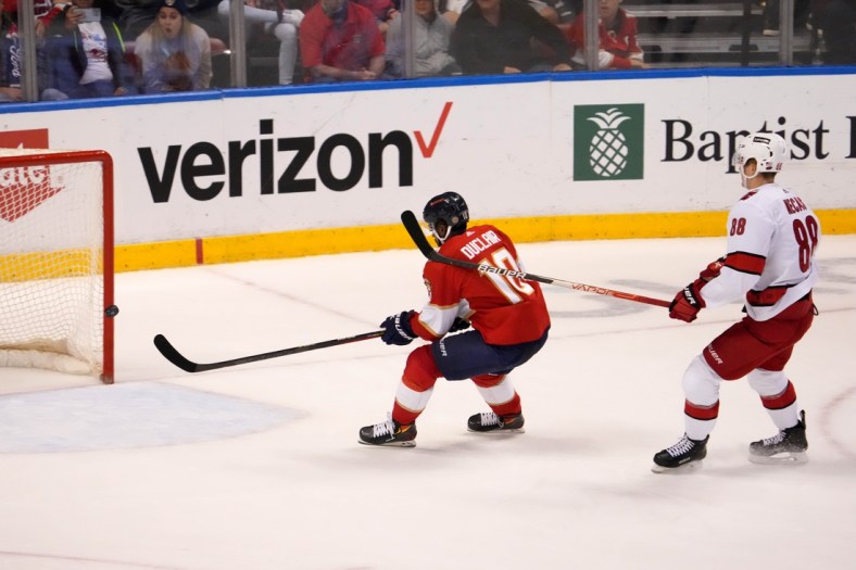 Nov 6, 2021; Sunrise, Florida, USA; Florida Panthers left wing Anthony Duclair (10) scores and empty net goal in front of Carolina Hurricanes center Martin Necas (88) during the third period at FLA Live Arena. Mandatory Credit: Jasen Vinlove-USA TODAY Sports