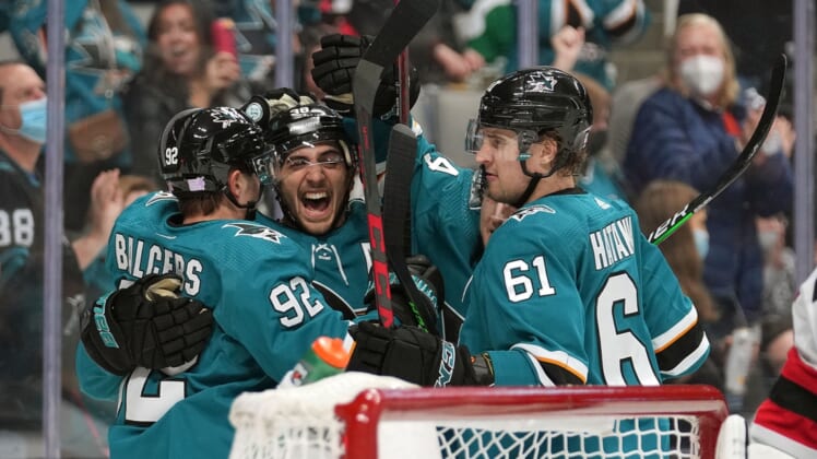 Nov 6, 2021; San Jose, California, USA; San Jose Sharks players celebrate after a goal by left wing Rudolfs Balcers (92) during the second period against the New Jersey Devils at SAP Center at San Jose. Mandatory Credit: Darren Yamashita-USA TODAY Sports