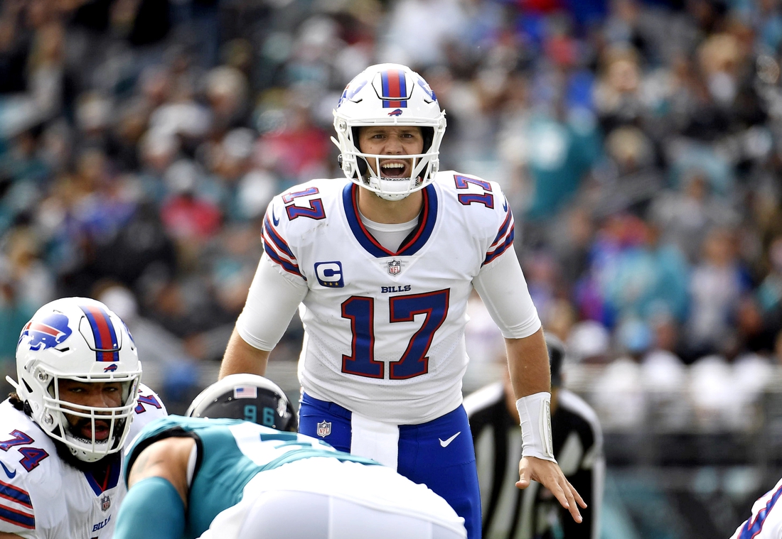 Jacksonville, FL, USA. 7th Nov, 2021. Buffalo Bills quarterback Josh Allen  (17) fumbles the ball while being tackled by Jacksonville Jaguars defensive  end Dawuane Smoot (91) during 2nd half NFL football game