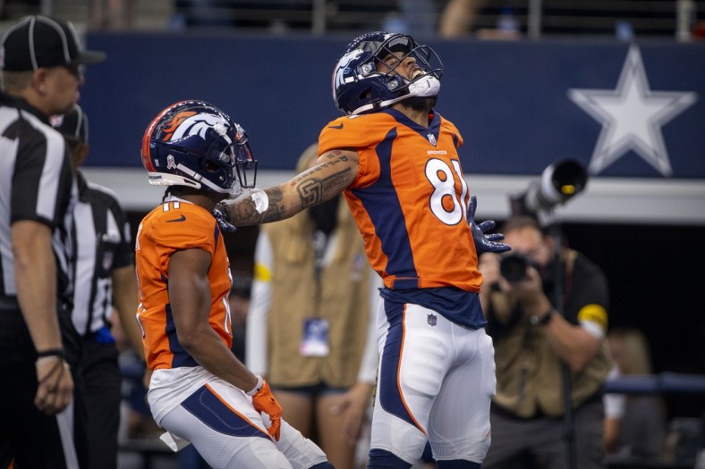 Nov 7, 2021; Arlington, Texas, USA; Denver Broncos wide receiver Tim Patrick (81) and wide receiver Diontae Spencer (11) celebrates a touchdown against the Dallas Cowboys during the second quarter at AT&T Stadium. Mandatory Credit: Jerome Miron-USA TODAY Sports