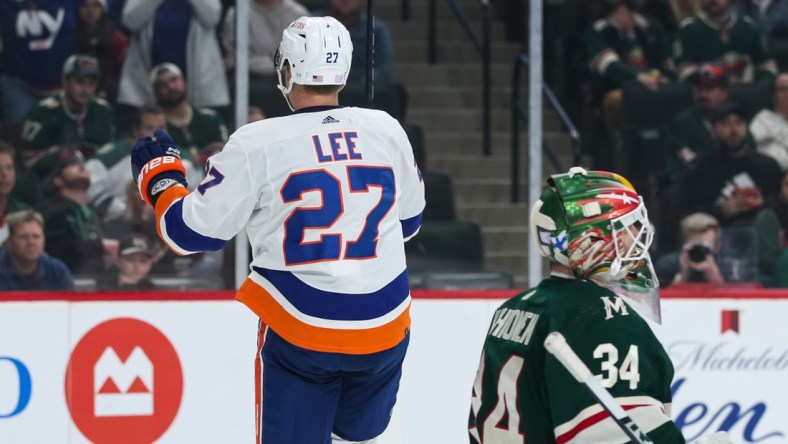 Nov 7, 2021; Saint Paul, Minnesota, USA; New York Islanders left wing Anders Lee (27) celebrates after scoring a goal against Minnesota Wild goaltender Kaapo Kahkonen (34) in the first period at Xcel Energy Center. Mandatory Credit: David Berding-USA TODAY Sports