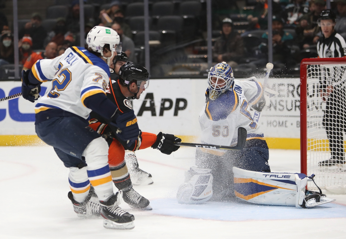 Nov 7, 2021; Anaheim, California, USA; Anaheim Ducks center Sam Carrick (39) scores a goal against St. Louis Blues goalie Jordan Binnington (50) during the second period at Honda Center. Mandatory Credit: Kiyoshi Mio-USA TODAY Sports