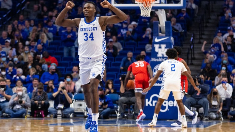 Nov 12, 2021; Lexington, Kentucky, USA; Kentucky Wildcats forward Oscar Tshiebwe (34) celebrates a basket during the first half against the Robert Morris Colonials at Rupp Arena at Central Bank Center. Mandatory Credit: Jordan Prather-USA TODAY Sports