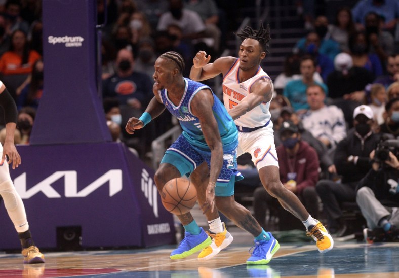 Nov 12, 2021; Charlotte, North Carolina, USA;  Charlotte Hornets guard Terry Rozier (3) drives in during the first half against the New York Knicks at the Spectrum Center. Mandatory Credit: Sam Sharpe-USA TODAY Sports