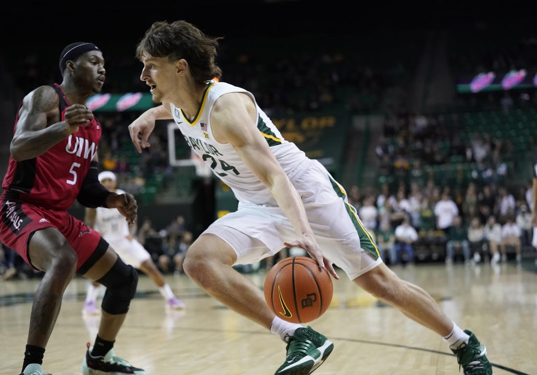 Nov 12, 2021; Waco, Texas, USA;  Baylor Bears guard Matthew Mayer (24) drives to the basket against against the Incarnate Word Cardinals during the first half of a game at Ferrell Center. Mandatory Credit: Chris Jones-USA TODAY Sports