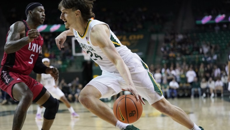 Nov 12, 2021; Waco, Texas, USA;  Baylor Bears guard Matthew Mayer (24) drives to the basket against against the Incarnate Word Cardinals during the first half of a game at Ferrell Center. Mandatory Credit: Chris Jones-USA TODAY Sports