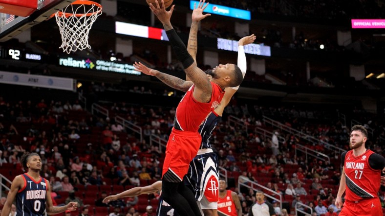 Nov 12, 2021; Houston, Texas, USA; Portland Trail Blazers guard Damian Lillard (0) drives for a layup attempt against the Houston Rockets during the fourth quarter at Toyota Center. Mandatory Credit: Erik Williams-USA TODAY Sports