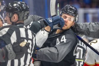 Nov 13, 2021; Tampa, Florida, USA; Tampa Bay Lightning defenseman Jan Rutta (44) is punched by Florida Panthers left wing Ryan Lomberg (94) in the first period at Amalie Arena. Mandatory Credit: Nathan Ray Seebeck-USA TODAY Sports