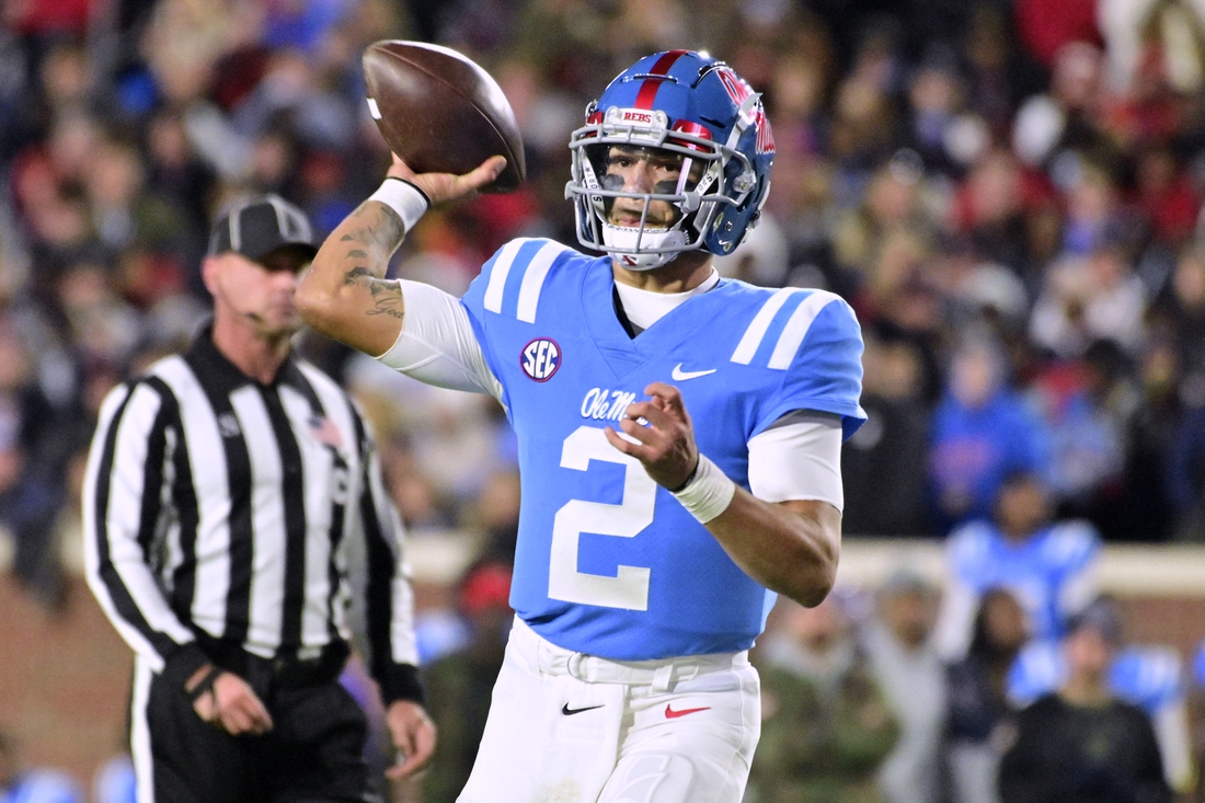 Nov 13, 2021; Oxford, Mississippi, USA; Mississippi Rebels quarterback Matt Corral (2) throws a pass against the Texas A&M Aggies during the first quarter at Vaught-Hemingway Stadium. Mandatory Credit: Matt Bush-USA TODAY Sports