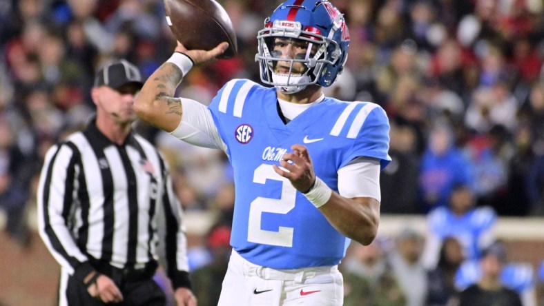 Nov 13, 2021; Oxford, Mississippi, USA; Mississippi Rebels quarterback Matt Corral (2) throws a pass against the Texas A&M Aggies during the first quarter at Vaught-Hemingway Stadium. Mandatory Credit: Matt Bush-USA TODAY Sports