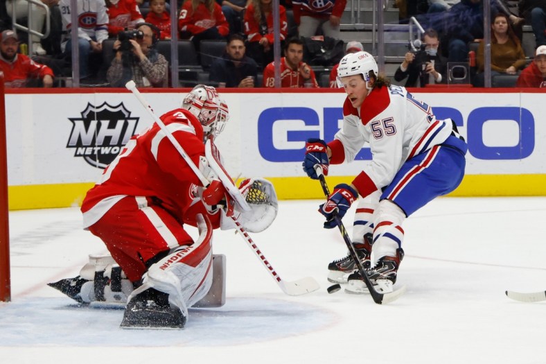 Nov 13, 2021; Detroit, Michigan, USA;  Detroit Red Wings goaltender Alex Nedeljkovic (39) makes a save on Montreal Canadiens left wing Michael Pezzetta (55) in the first period at Little Caesars Arena. Mandatory Credit: Rick Osentoski-USA TODAY Sports