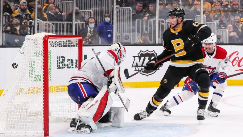 Nov 14, 2021; Boston, Massachusetts, USA; Boston Bruins center Charlie Coyle (13) scores a goal during the third period against the Montreal Canadiens at TD Garden. Mandatory Credit: Paul Rutherford-USA TODAY Sports